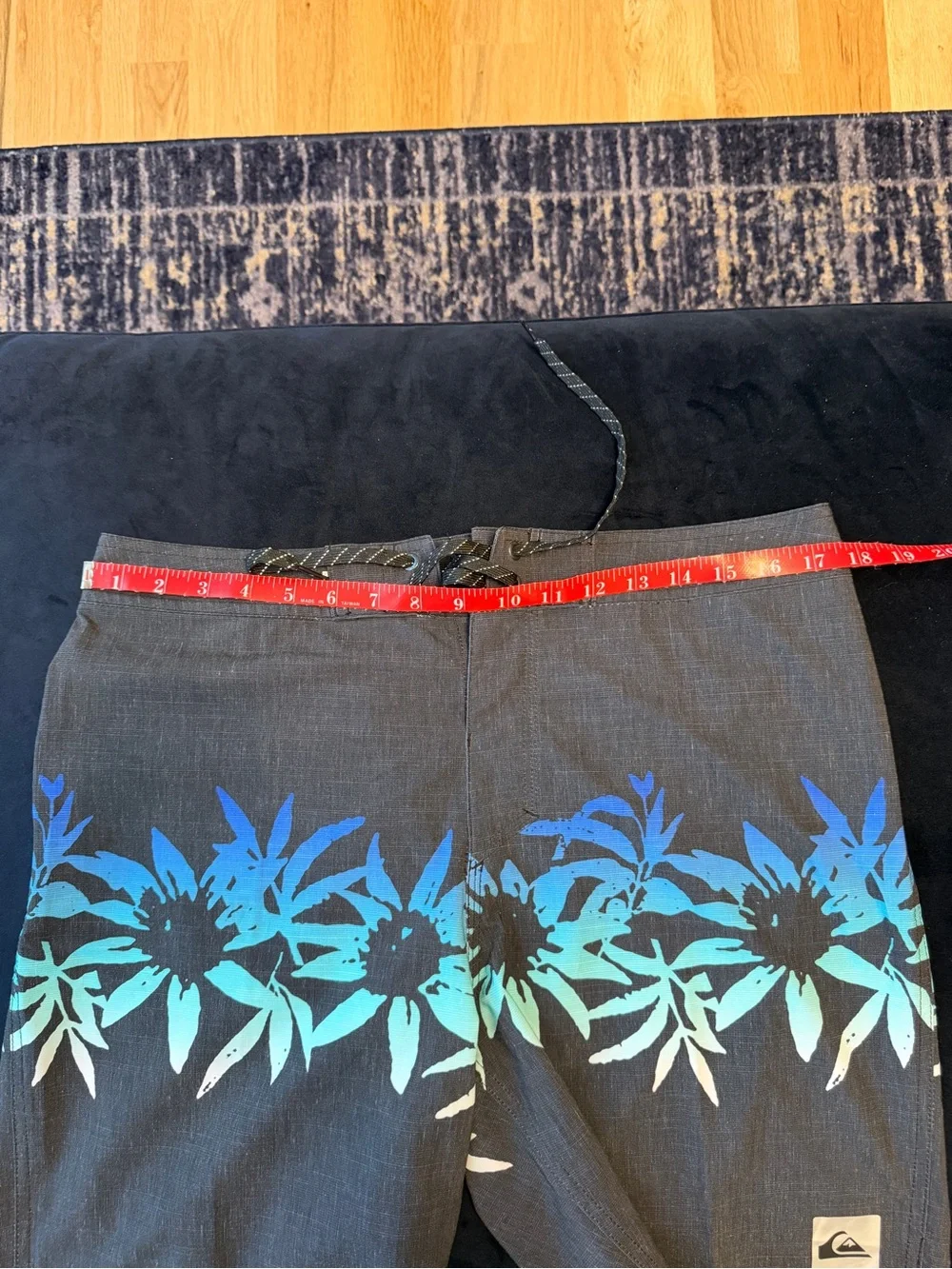 Quiksilver Men’s Black Boardshorts with Blue-Teal Floral Band